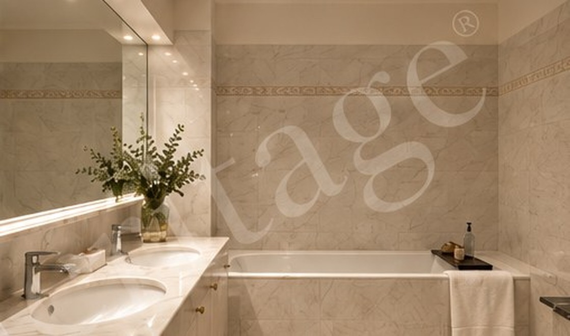 Salle de bains en pierre claire, baignoire et double vasque